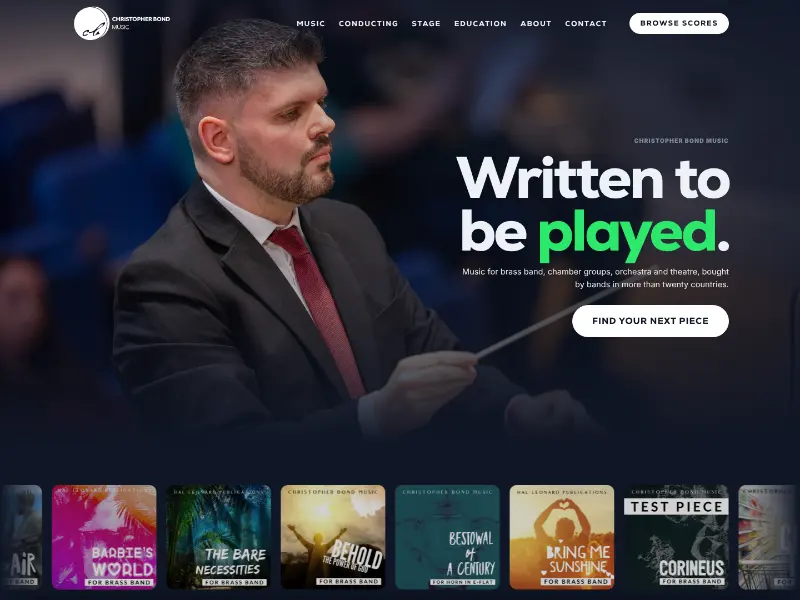 The new site: Christopher conducting, the line &ldquo;Written to be played&rdquo; and a row of score covers