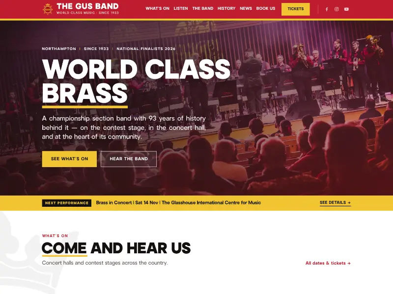 The new GUS Band site: &ldquo;World class brass&rdquo; over a dark red photograph of the band, with the next performance and tickets